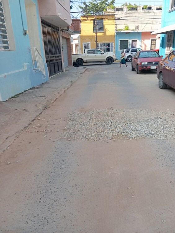 el Municipio les reparó el socavón