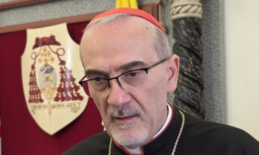 Líder católica preside misa en iglesia destruida por bombardeos en Gaza. "Seguimos Aquí"