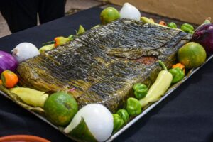 La Feria del Mucbipollo de Mérida ofrecerá la representación del tradicional entierro del pib, una práctica de origen maya vinculada al Janal Pixán, para preservar las costumbres y fortalecer la identidad cultural de Yucatán.